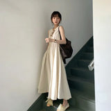 Amfeov-Romantic French style Cold Feeling Japan fashion Sleeveless Apricot Dress 2024 New Women Summer Temperament Sling Long Skirt